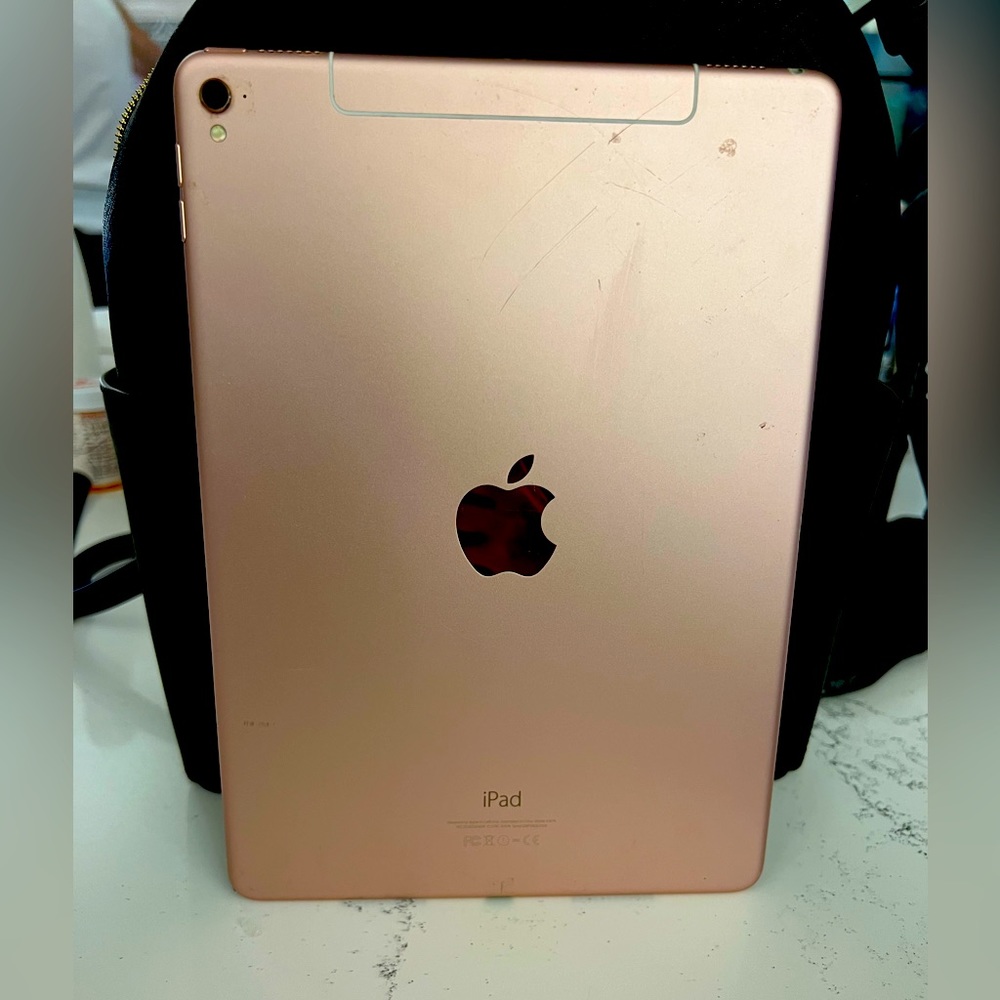 Apple iPad Air with some wear and tear only on the outer portion